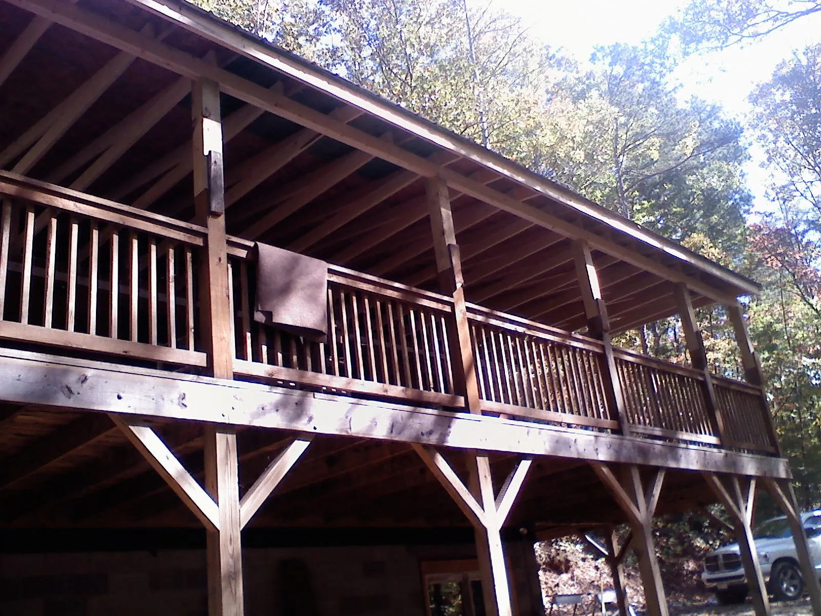 Timber framing under a new elevated porch and deck — Roof Leak Repair in Lindale by Roofing Brothers